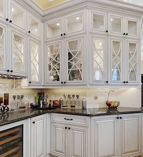 Artesia's Upper Cabinets using Omega's Q Style Mullion Door